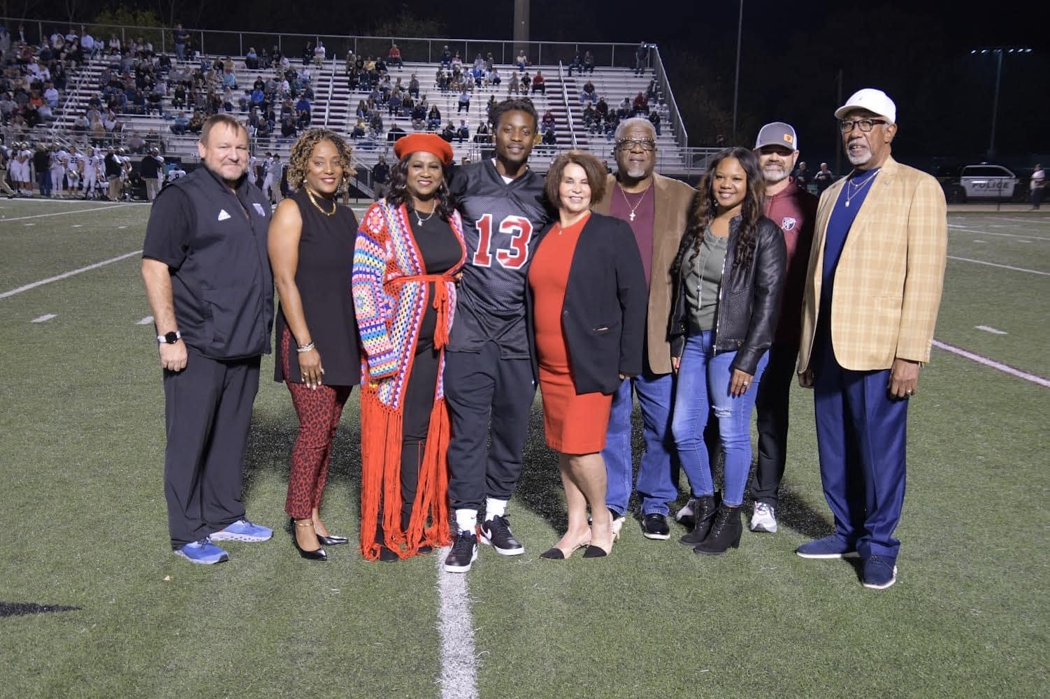 A group of 21 Kids Foundation supporters posed with Dr. Cheryl Sington, EOC director, during the Nov. 4 partnership announcement. Pictured are, from left, Kevin Young, Gadsden City High School principal; Charlotte Worthy, board president of 21 Kids Foundation; Kim Kirkpatrick, mother of Dre Kirkpatrick; Sington; Charles Kirkpatrick, father of Dre Kirkpatrick; Dre Kirkpatrick, founder of 21 Kids Foundation; Apriele Kirkpatrick, sister of Dre Kirkpatrick and a member of the 21 Kids Foundation Board of Directors; Todd Lambert, GCHS athletic director; and Wayne Rowe, member of the 21 Kids Foundation Board of Directors.