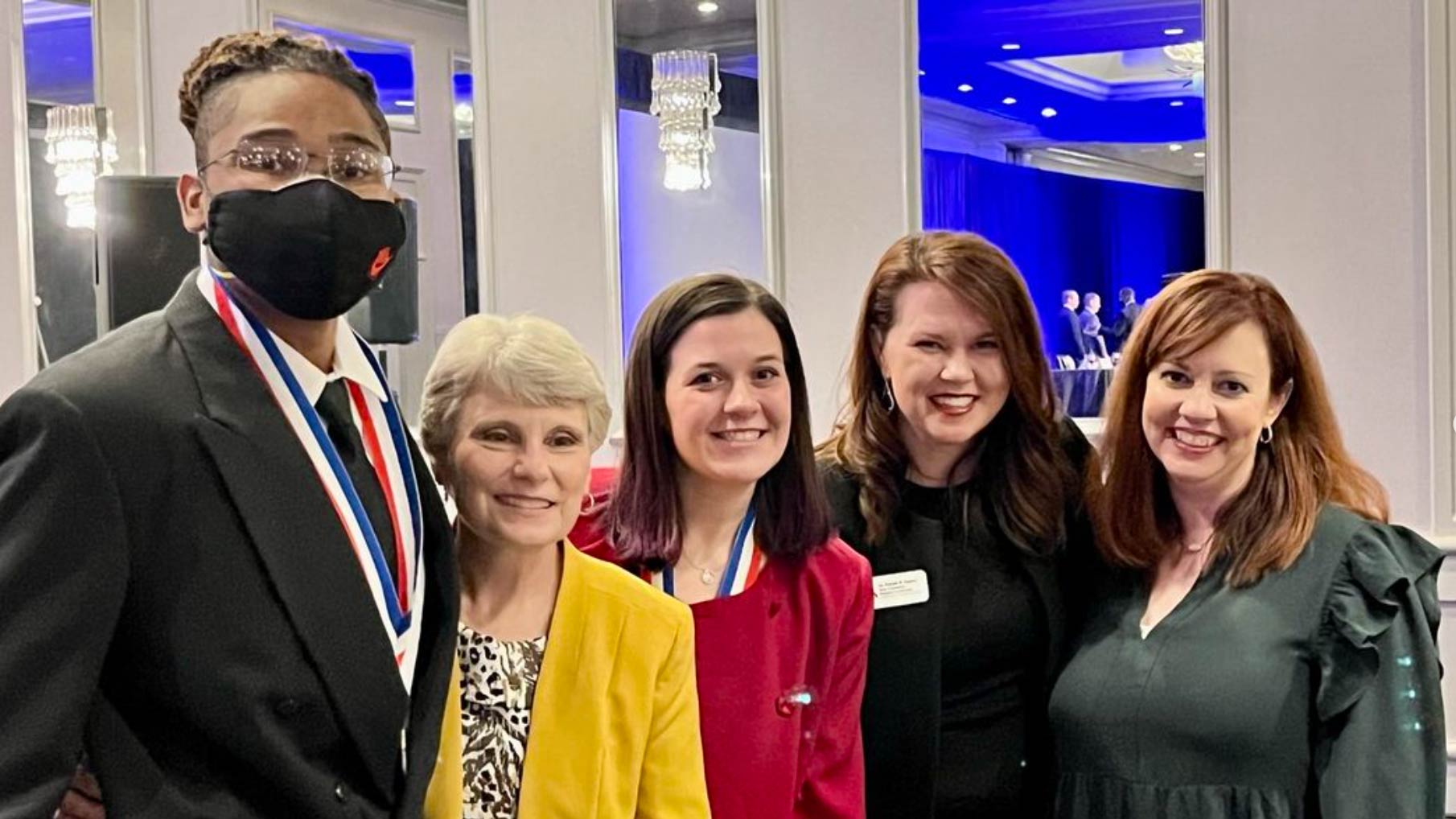 All-Alabama Academic team members Jase Jelks, left, and Kennedy Fox, center, attended a recognition program at The Wynfrey Hotel in Birmingham on April 22, 2022. Also in attendence were Gadsden State President Dr. Kathy Murphy, in yellow, Dean of Academic Programs and Services Dr. Farrah Hayes, in black, and Director of Student Support Services Melissa Davis, in green.