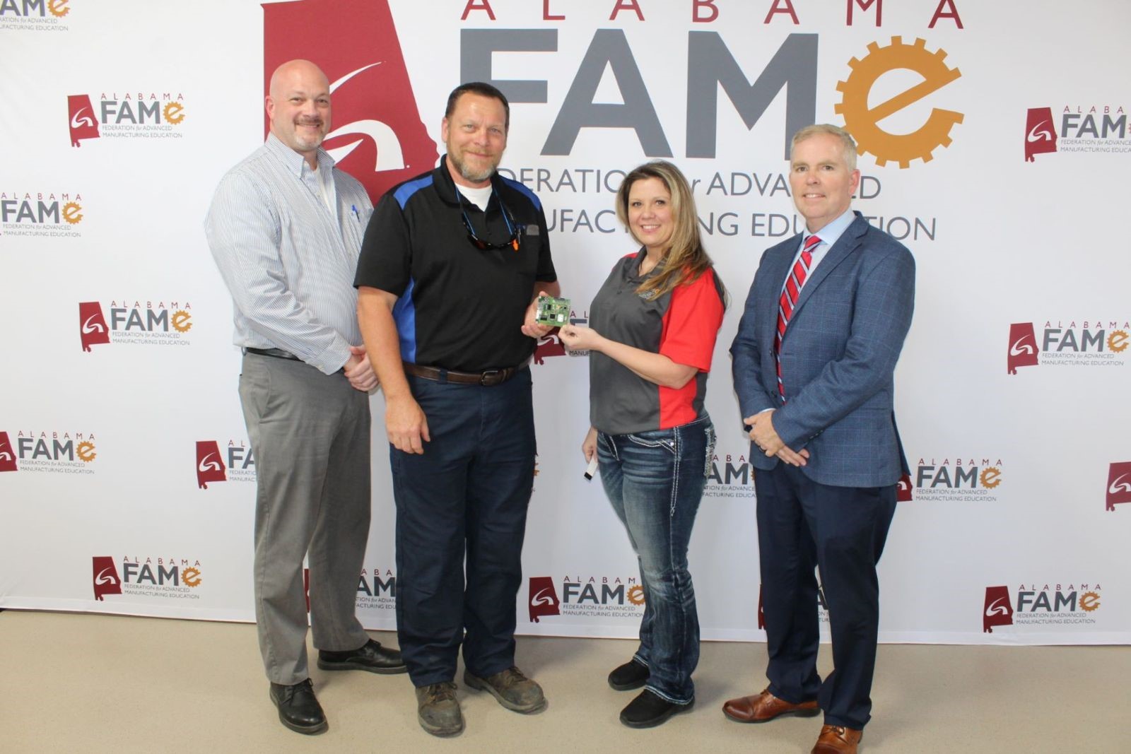 Jerry Creel, training manager at Kronospan; Tim Lewis, maintenance manager at Kronospan; Tarina Vannatta, FAME program instructor; and Alan Smith, dean of Workforce Development